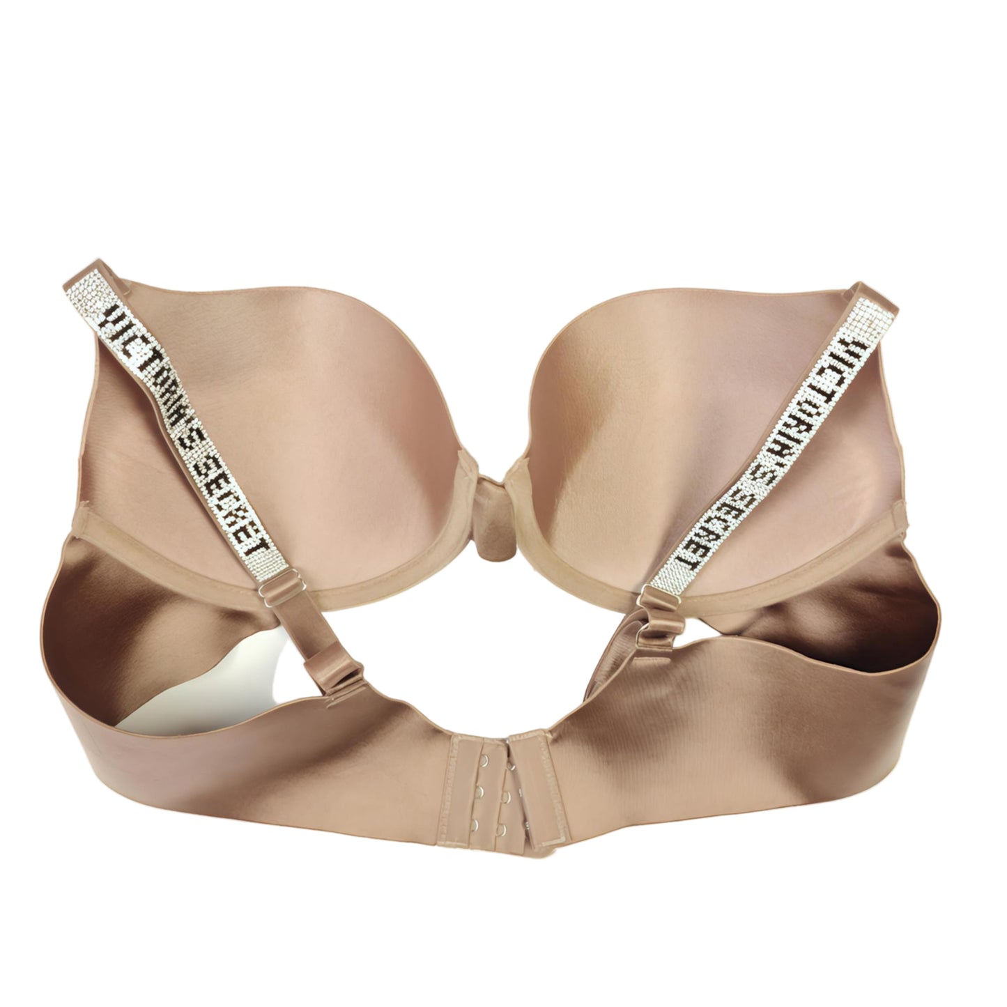 Beige bra with 'Victoria's Secret' straps on a white background