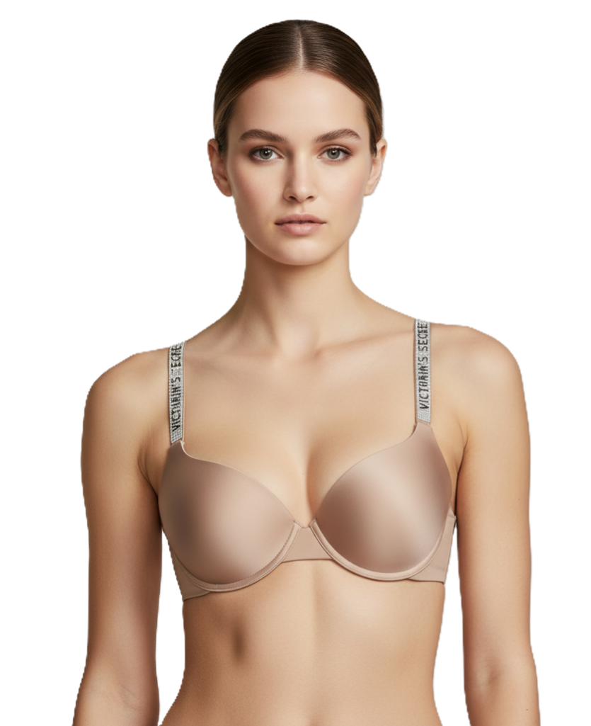 Woman wearing a beige bra with 'Victoria's Secret' branding on a white background