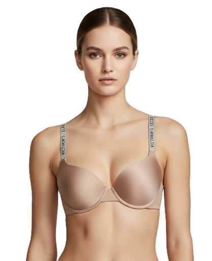 Woman wearing a beige bra with 'Victoria's Secret' branding on a white background