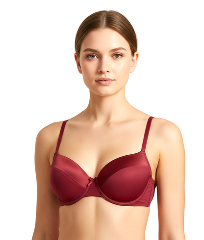 Woman wearing a red bra against a beige background