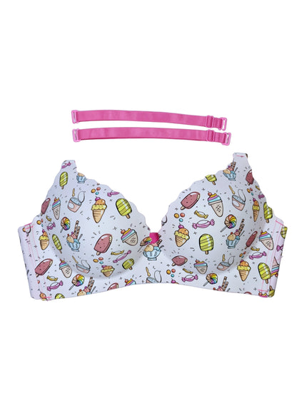 Bra with colorful ice cream pattern and pink straps on a light blue background