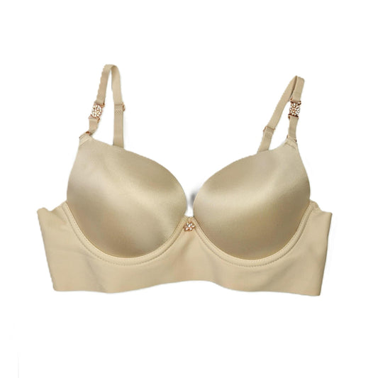 Beige bra on a white background