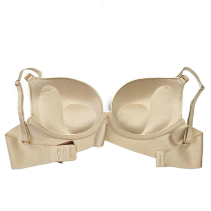 Beige bra on a white background