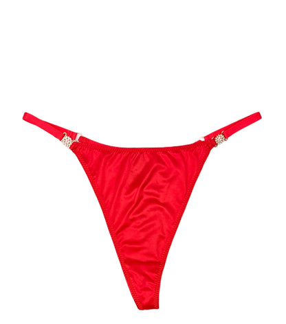 Red bikini bottom with floral embellishments on a white background