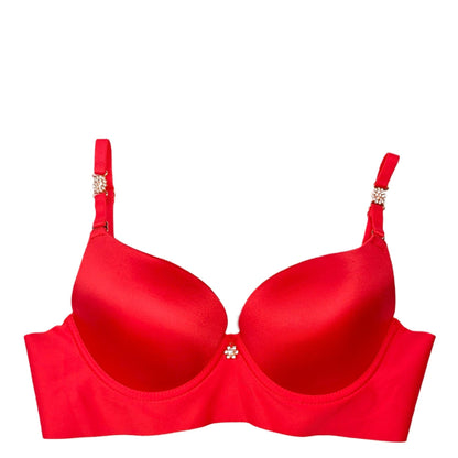 Red bra with decorative straps on a white background
