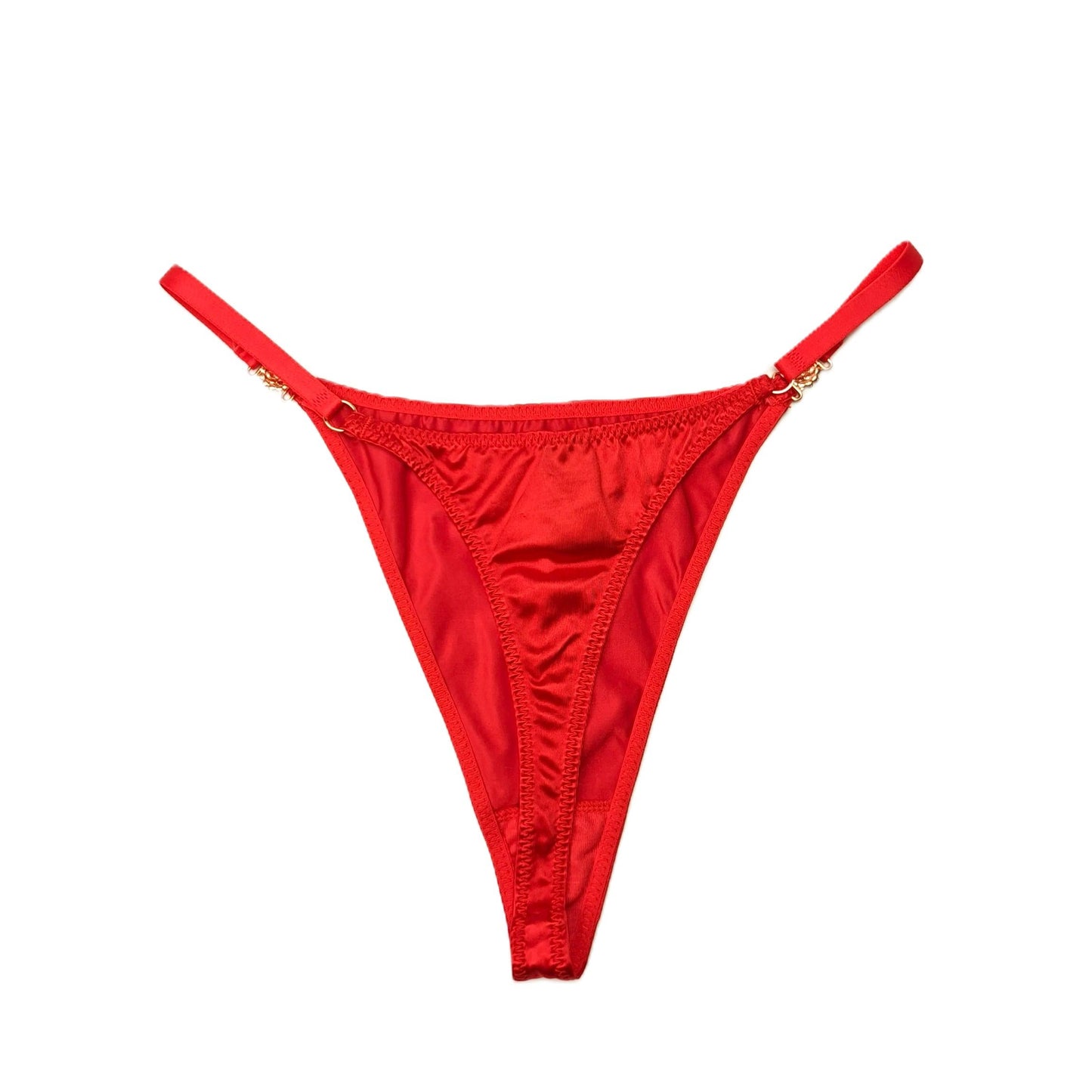 Red thong bikini bottom on a white background