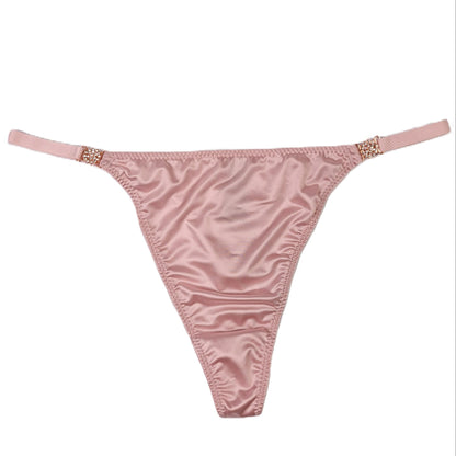 Pink thong on a white background