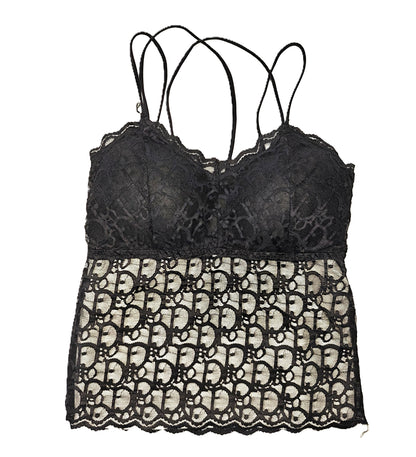 a black lace longline bralette on a white background