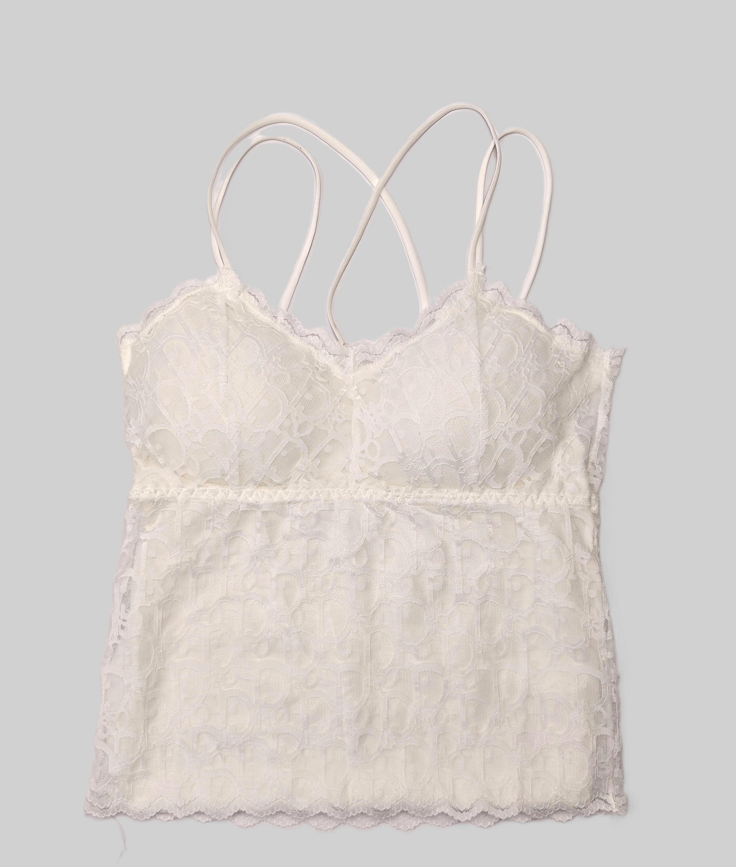 White lace longline bralette with thin straps on a white background