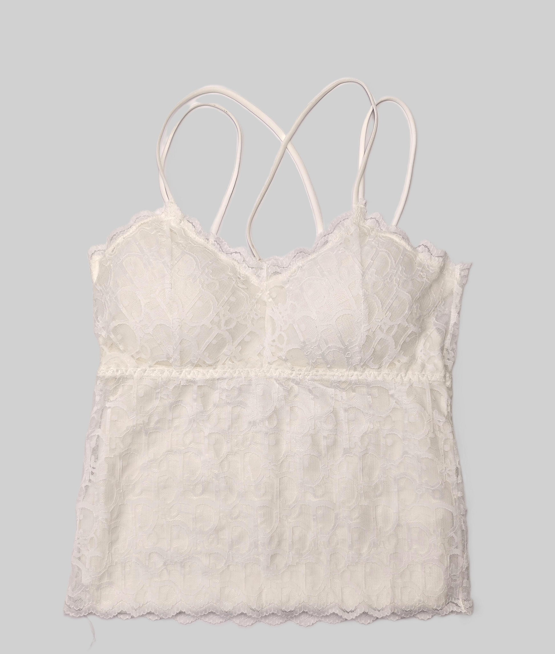 White lace longline bralette with thin straps on a white background